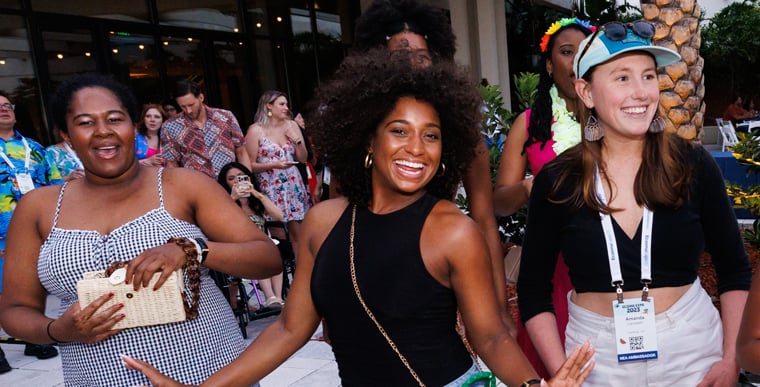 Three women posing for picture